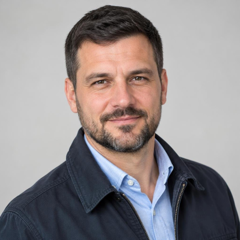 Portrait of a bearded man in a casual jacket