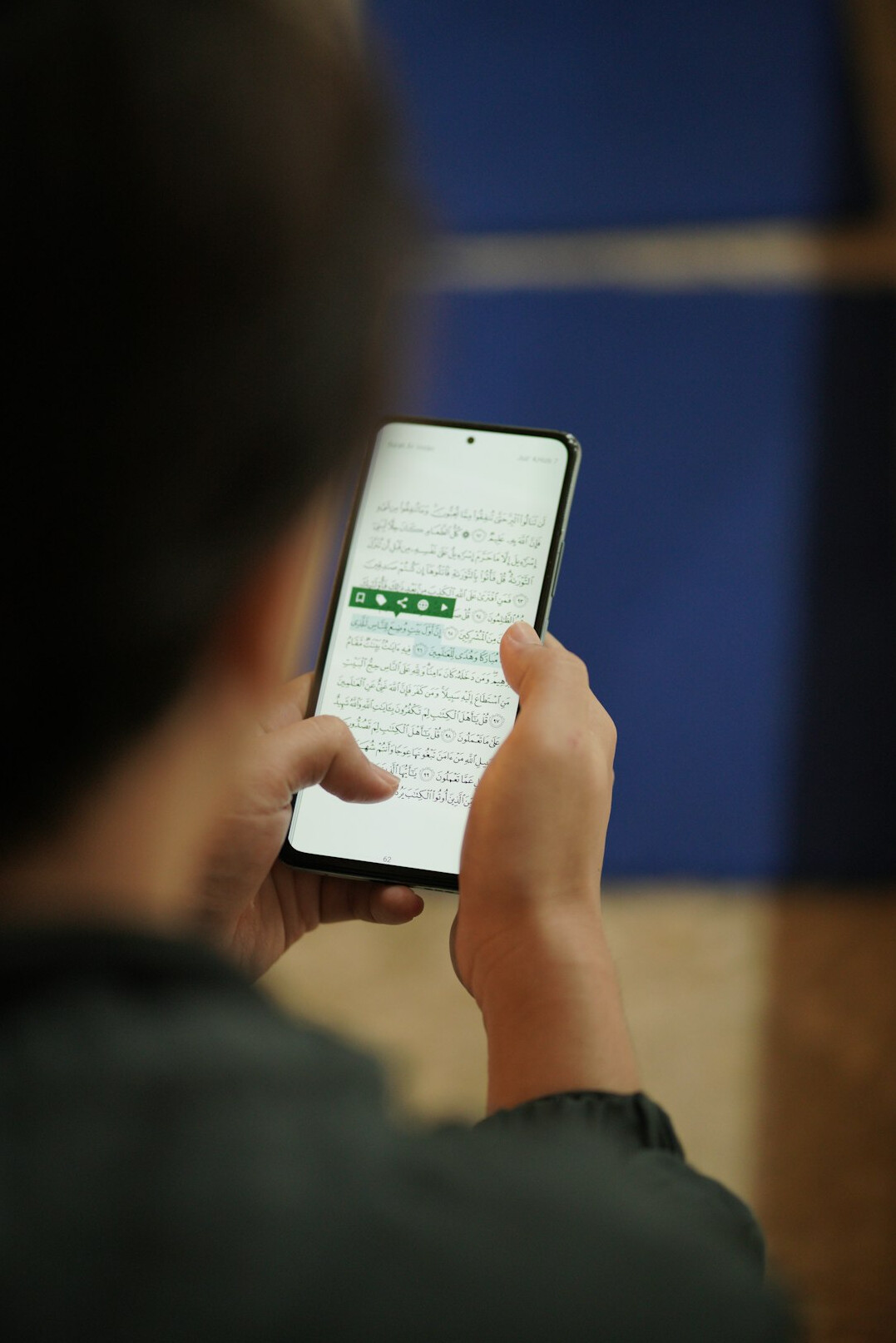 person reading reviews on phone